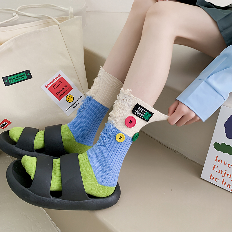 Geknöpfte Bettler-Farbblocksocken