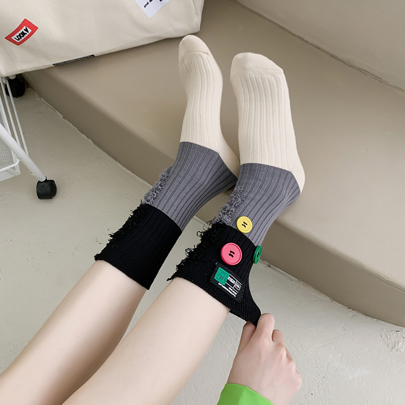Geknöpfte Bettler-Farbblocksocken