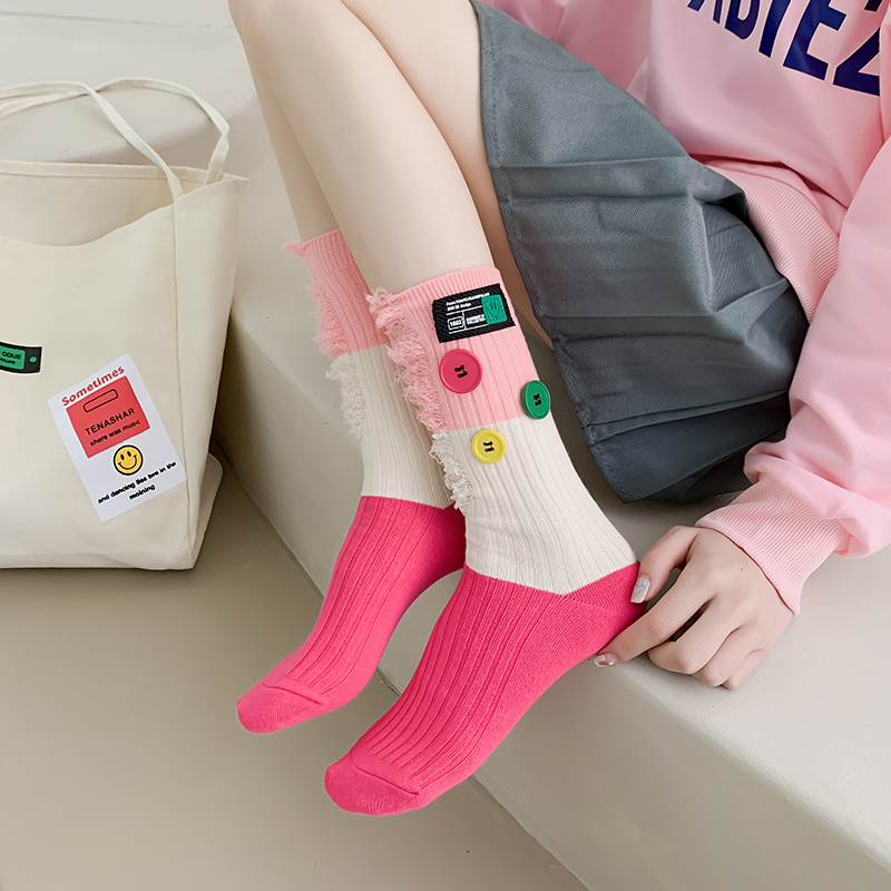 Geknöpfte Bettler-Farbblocksocken