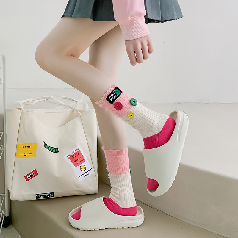 Geknöpfte Bettler-Farbblocksocken