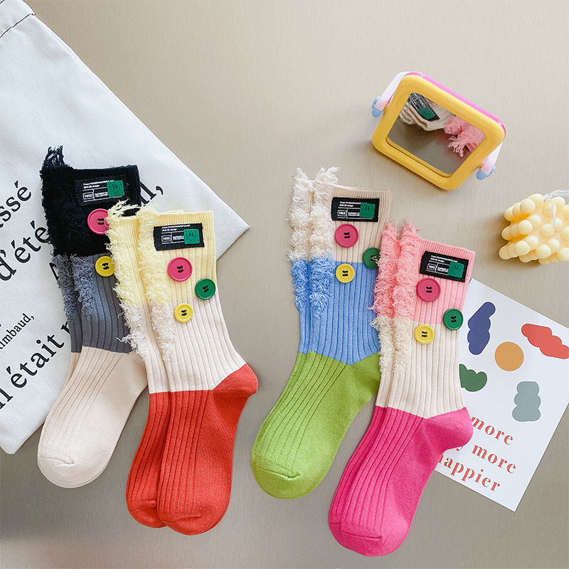 Geknöpfte Bettler-Farbblocksocken