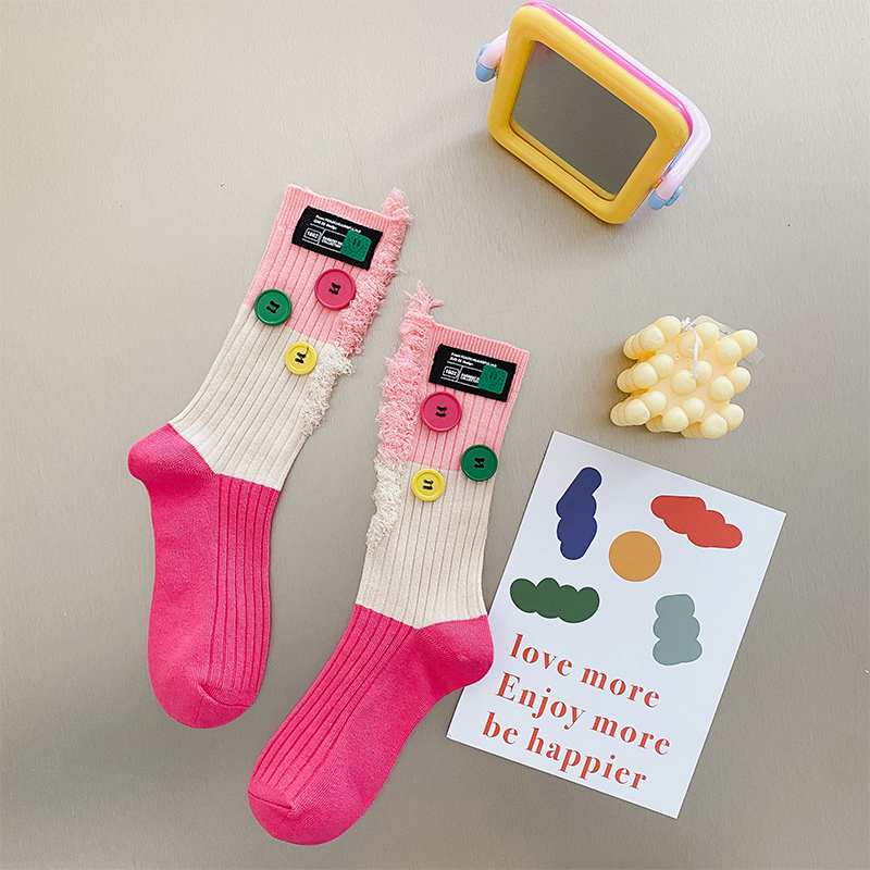 Geknöpfte Bettler-Farbblocksocken