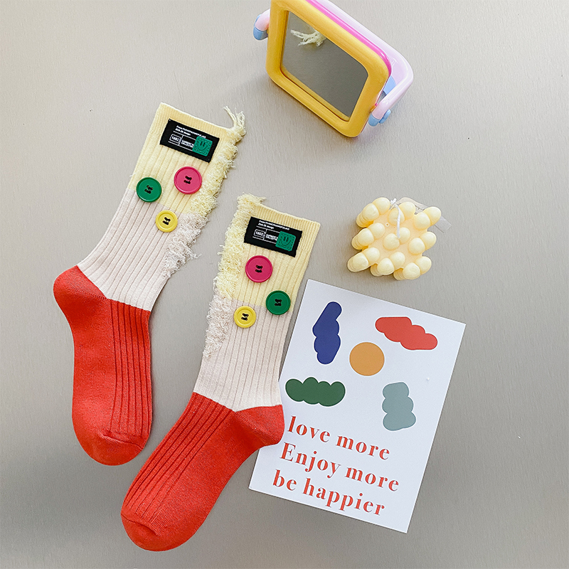Geknöpfte Bettler-Farbblocksocken