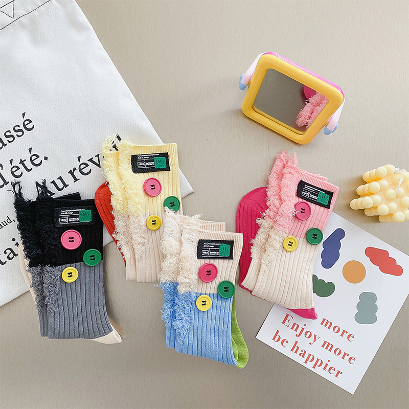Geknöpfte Bettler-Farbblocksocken