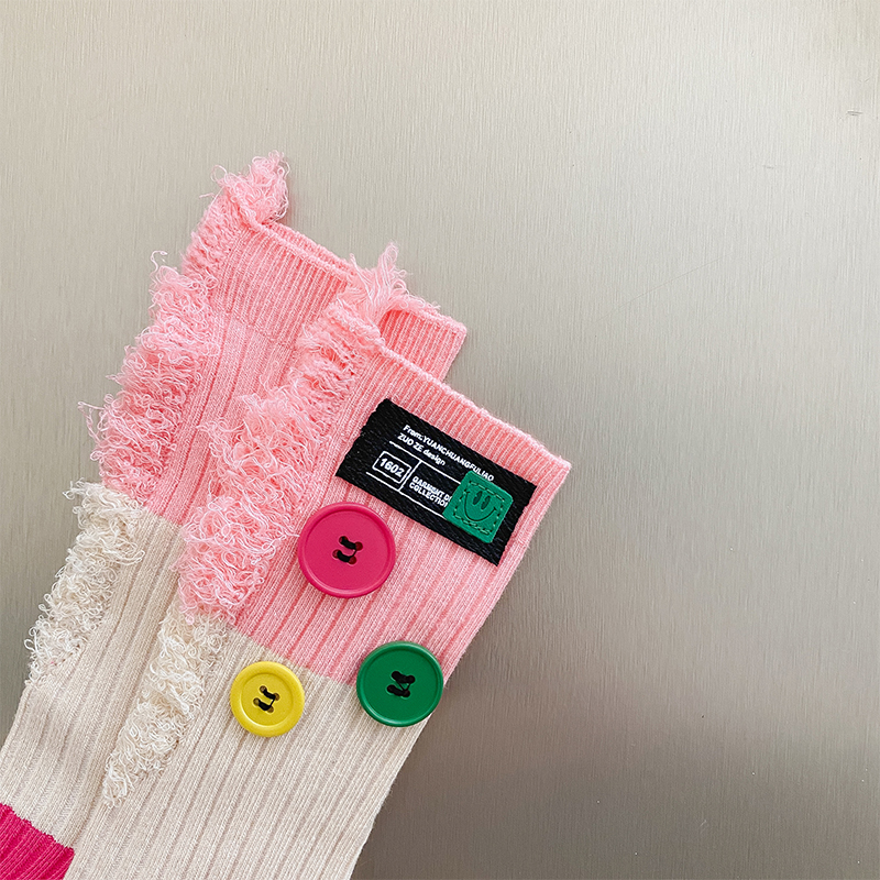 Geknöpfte Bettler-Farbblocksocken