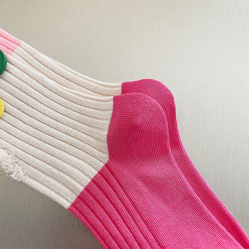 Geknöpfte Bettler-Farbblocksocken
